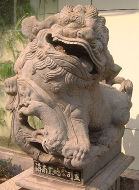 Guardian lion in Haikou (female)