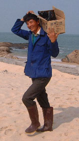 A man with a box on his shoulder